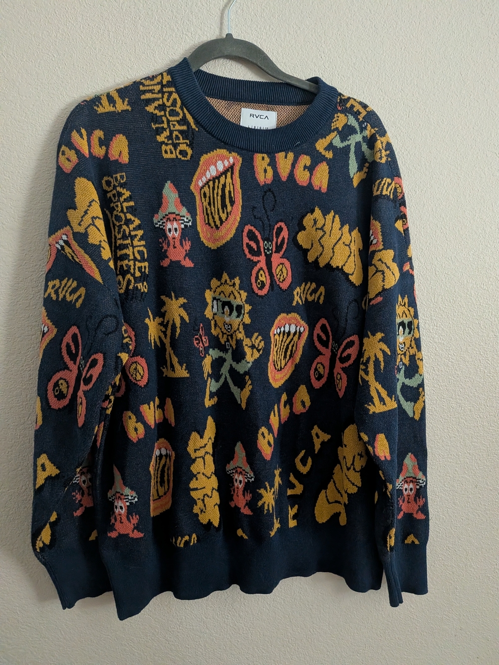 RVCA Navy Crewneck Sweater with Yellow & Coral Graphic Motifs